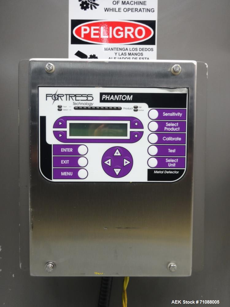 Used Fotress Phantom Big Bag Metal Detector. serial #I-17282, 26" x 24" aperature. Sensitivity: detection of 1.4 - 2.0 mm stainless steel and 0.9 - 1.5mm Ferrous. Includes mesh belt conveyor Model SC...