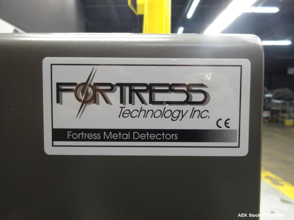 Used Fotress Phantom Big Bag Metal Detector. serial #I-17282, 26" x 24" aperature. Sensitivity: detection of 1.4 - 2.0 mm stainless steel and 0.9 - 1.5mm Ferrous. Includes mesh belt conveyor Model SC...