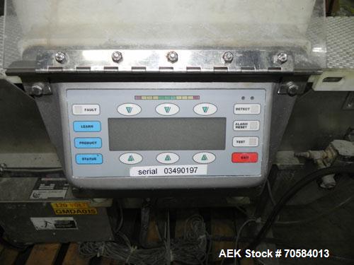 Used Goring-Kerr (Thermo-Engineering) DSP3/S-PSU Metal Detector.  Machine has a 16" wide x 4.5" high aperture.  Has a 16'' wide x 62'' long belt conveyor.  Last used on a frozen pizza line.  3/60/120...