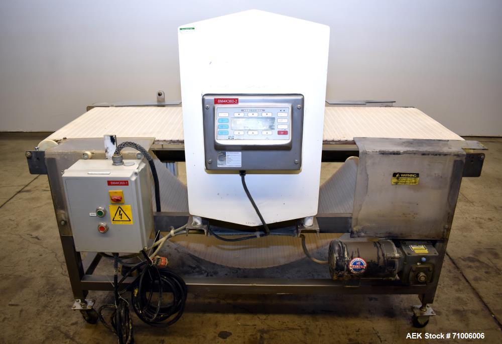 Used Goring Kerr Metal Detector, Model DSP2, 23.75" Wide x 11" high aperture. 22"Wide x 72" long plastic mattop conveyor. Stop belt reject. All stainless steel frame with casters.  3/60/208V (met Det...