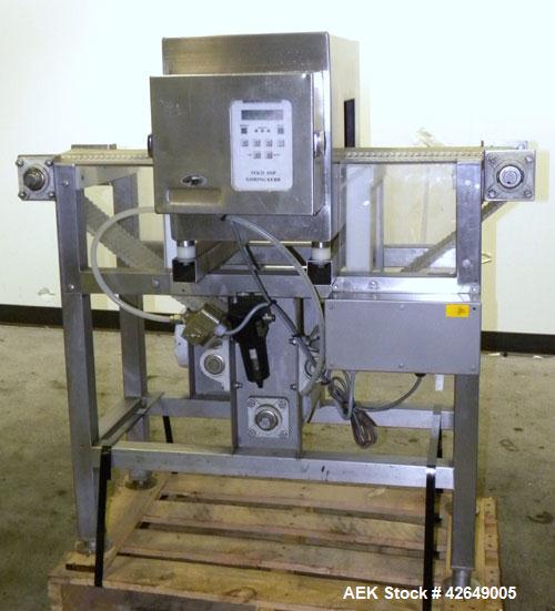 Used Goring Kerr Metal Detector, Model TEK 21 DSP. Usable aperture size 7-7/8" wide x 4-1/4" high. Includes a plastic belt conveyor, driven by a 1/2hp, 3/60/230/460 volt, 1725 rpm gear motor, ratio 2...