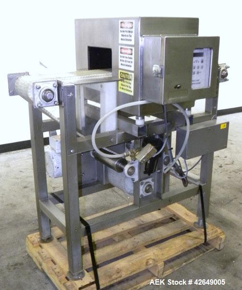Used Goring Kerr Metal Detector, Model TEK 21 DSP. Usable aperture size 7-7/8" wide x 4-1/4" high. Includes a plastic belt conveyor, driven by a 1/2hp, 3/60/230/460 volt, 1725 rpm gear motor, ratio 2...