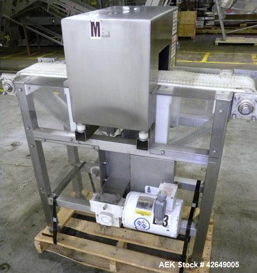 Used Goring Kerr Metal Detector, Model TEK 21 DSP. Usable aperture size 7-7/8" wide x 4-1/4" high. Includes a plastic belt conveyor, driven by a 1/2hp, 3/60/230/460 volt, 1725 rpm gear motor, ratio 2...