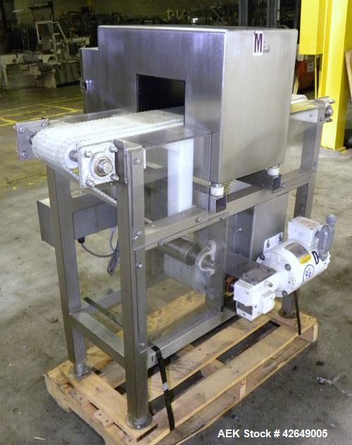 Used Goring Kerr Metal Detector, Model TEK 21 DSP. Usable aperture size 7-7/8" wide x 4-1/4" high. Includes a plastic belt conveyor, driven by a 1/2hp, 3/60/230/460 volt, 1725 rpm gear motor, ratio 2...