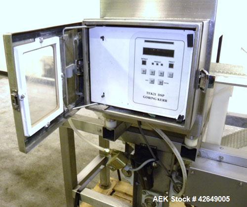 Used Goring Kerr Metal Detector, Model TEK 21 DSP. Usable aperture size 7-7/8" wide x 4-1/4" high. Includes a plastic belt conveyor, driven by a 1/2hp, 3/60/230/460 volt, 1725 rpm gear motor, ratio 2...