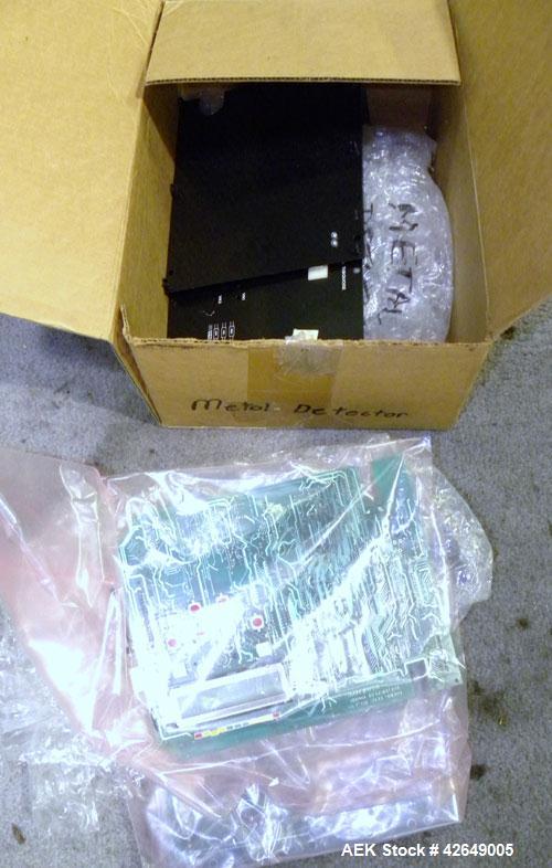 Used Goring Kerr Metal Detector, Model TEK 21 DSP. Usable aperture size 7-7/8" wide x 4-1/4" high. Includes a plastic belt conveyor, driven by a 1/2hp, 3/60/230/460 volt, 1725 rpm gear motor, ratio 2...