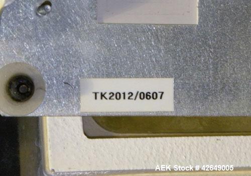 Used- Goring Kerr Metal Detector, Model TEK 21 DSP. Usable aperture size 7-7/8" wide x 4-1/4" high. Includes a plastic belt ...