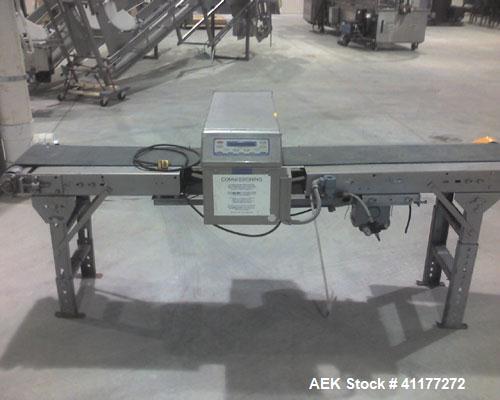 Used Loma IQ series metal detector. Has 16"W x 5"H aperature. Ferrous 2mm, Non Ferrous 2.5mm & Stainless steel 5mm. Mounted on 90"L x 16"W conveyor with 10"w belt. Has solonoid for reject.