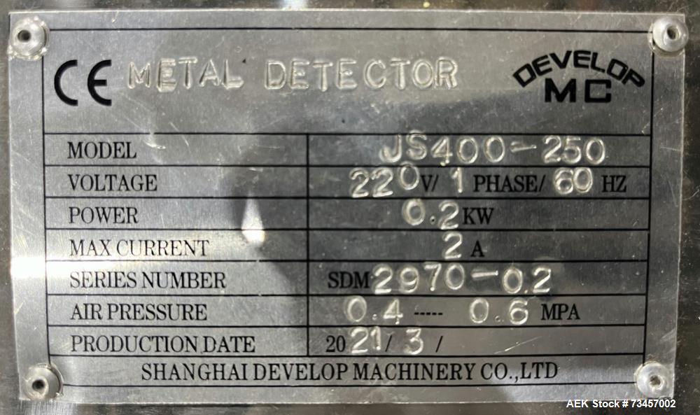 Used Shanghai Develop Machinery Co Model JS400-250 Metal Detector. 0.2kW. Air operated reject arm. 1/60/220 Volt, 2 Amp. Serial# 2970-02. Built 2021.