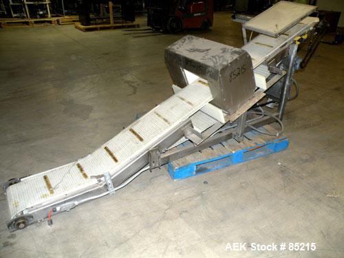 Used Lock Metalchek Metal Detector, Model 30CKE. Aperture size 14" wide x 7" high. Includes a 12" wide x 2' long bottom section x 8'6" long incline section x 46" discharge height plastic belt conveyo...