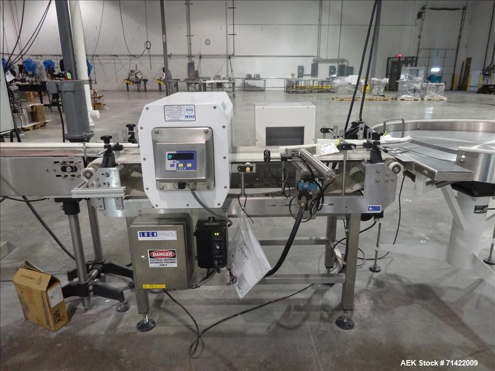 Used Loma Systems Metal Detector Conveyor, Lock Met30+, Mft. Lock, Serial N. 32348/1, 2007 conveyor 5'L, Opening 14" W, 7"H Buyers Premium of 15% will be charged on all sales. Purchaser responsible f...