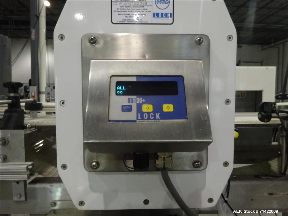 Used Loma Systems Metal Detector Conveyor, Lock Met30+, Mft. Lock, Serial N. 32348/1, 2007 conveyor 5'L, Opening 14" W, 7"H Buyers Premium of 15% will be charged on all sales. Purchaser responsible f...