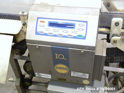 Used Loma IQ Superscan Micro Metal Detector, Stainless Steel Construction. Aperture 8" wide x 4" high. Includes a belt conveyor and air reject, approximate 33-1/2’’ discharge height. Machine footprin...
