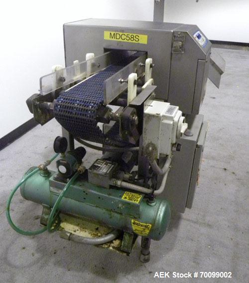 Used Loma IQ Superscan Micro Metal Detector, Stainless Steel Construction. Aperture 8" wide x 4" high. Includes a belt conveyor and air reject, approximate 33-1/2’’ discharge height. Machine footprin...