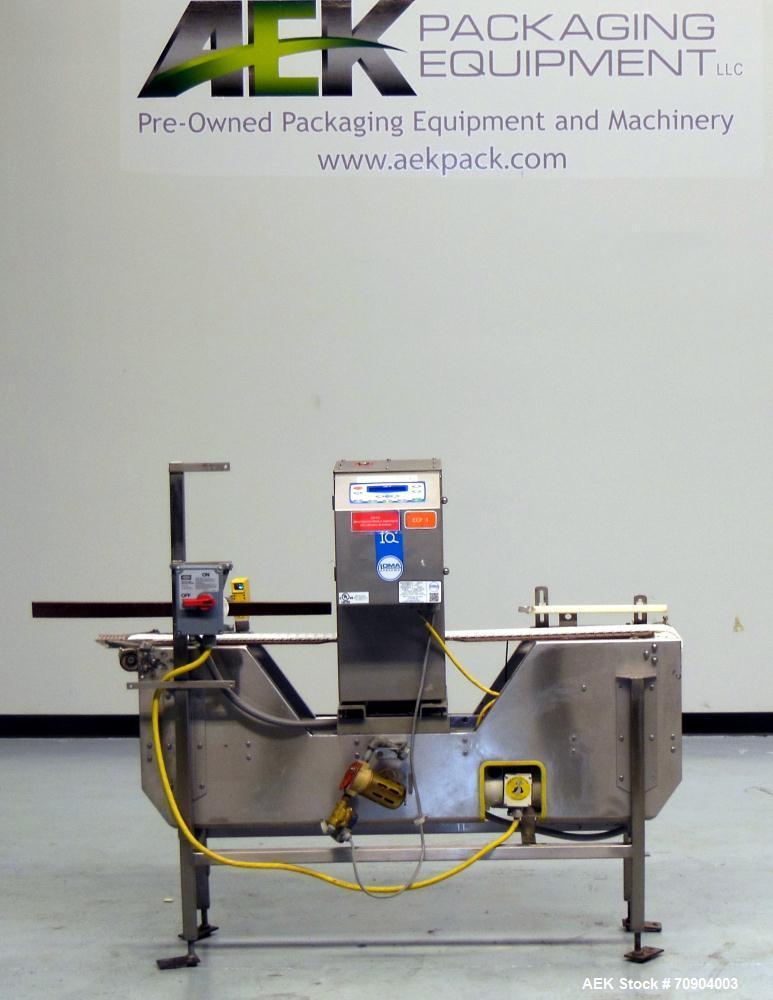 Used Loma IQ2 Conveyor Mounted Metal Detector.  Built 06/2004. Aperture size 100 mm (3-15/16") Wide x 350 mm (13-3/4 ") Tall, with belt 11-1/8" Tall. Sensitivity: up to 1.0mm Ferrous, 1.0mm Non-Ferro...