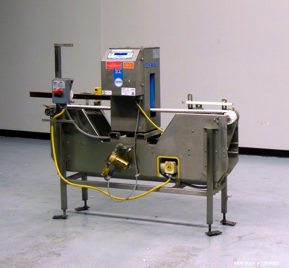 Used Loma IQ2 Conveyor Mounted Metal Detector.  Built 06/2004. Aperture size 100 mm (3-15/16") Wide x 350 mm (13-3/4 ") Tall, with belt 11-1/8" Tall. Sensitivity: up to 1.0mm Ferrous, 1.0mm Non-Ferro...