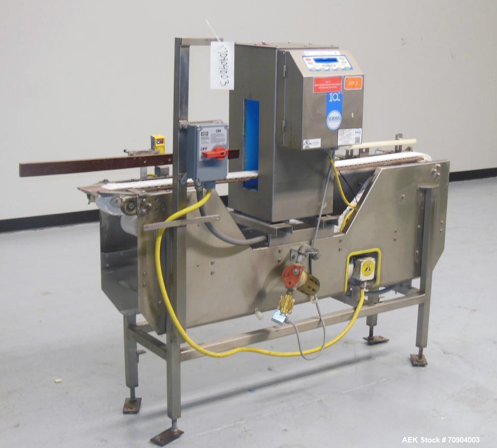 Used Loma IQ2 Conveyor Mounted Metal Detector.  Built 06/2004. Aperture size 100 mm (3-15/16") Wide x 350 mm (13-3/4 ") Tall, with belt 11-1/8" Tall. Sensitivity: up to 1.0mm Ferrous, 1.0mm Non-Ferro...
