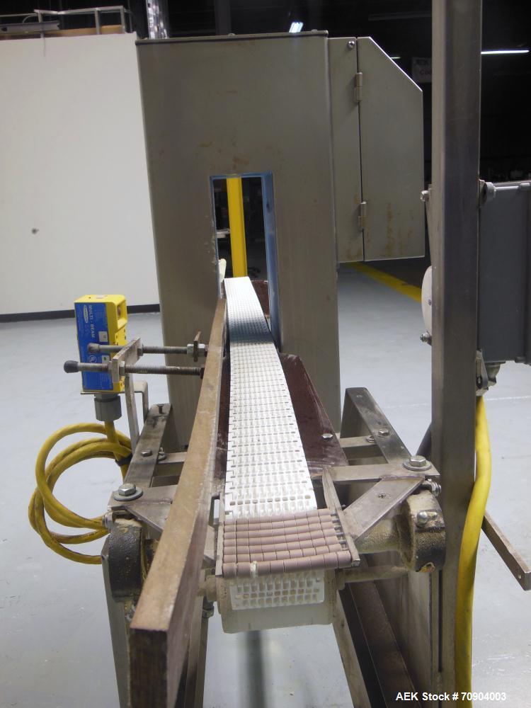 Used Loma IQ2 Conveyor Mounted Metal Detector.  Built 06/2004. Aperture size 100 mm (3-15/16") Wide x 350 mm (13-3/4 ") Tall, with belt 11-1/8" Tall. Sensitivity: up to 1.0mm Ferrous, 1.0mm Non-Ferro...