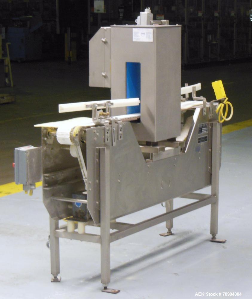 Used Loma IQ2 Conveyor Mounted Metal Detector.  Built 10/2002. Aperture size 100 mm (3 15/16") Wide X 350 mm (13 3/4") Tall, with belt 12 3/8" Tall. Sensitivity: up to 1.0mm Ferrous, 2mm Stainless St...