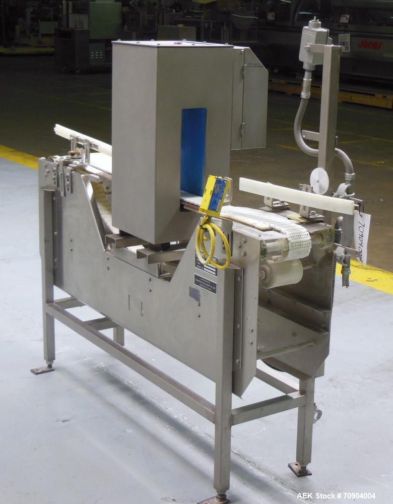 Used Loma IQ2 Conveyor Mounted Metal Detector.  Built 10/2002. Aperture size 100 mm (3 15/16") Wide X 350 mm (13 3/4") Tall, with belt 12 3/8" Tall. Sensitivity: up to 1.0mm Ferrous, 2mm Stainless St...