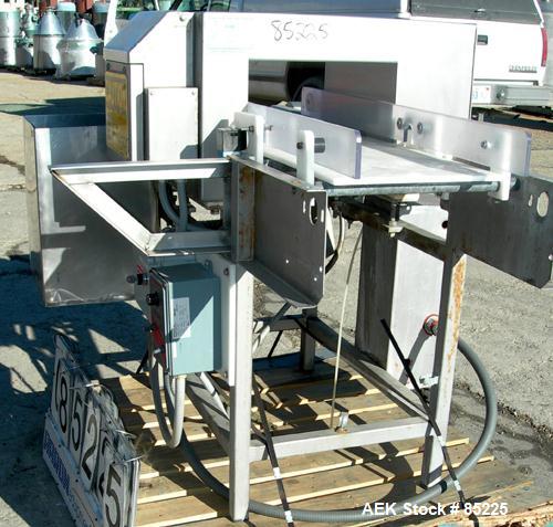 USED: Loma Super Superscan micro metal detector. Aperture size 14" wide x 8" high. Frequency 153.6 khz. Power 115 volt, 2 amp, 60 hz. 12" wide x 52" long conveyor, no belt. 1/2 hp DC motor with speed...