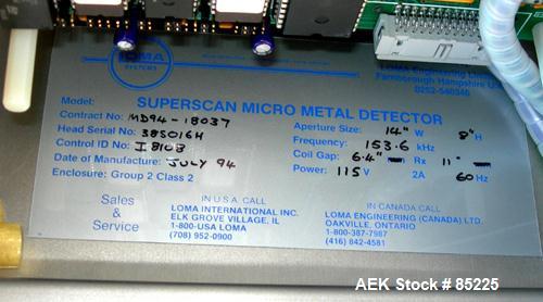 USED: Loma Super Superscan micro metal detector. Aperture size 14" wide x 8" high. Frequency 153.6 khz. Power 115 volt, 2 amp, 60 hz. 12" wide x 52" long conveyor, no belt. 1/2 hp DC motor with speed...