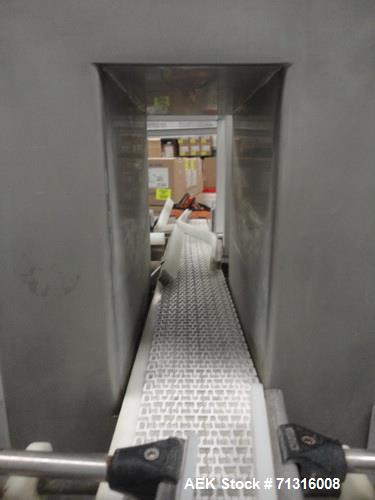 Used Loma Model IQ2 Metal Detector with conveyor and reject. Metal detector is vertical and last set up for solid dose bottling line. Head is 5"W x 10"H as 12"Deep. Includes integral chain conveyor w...