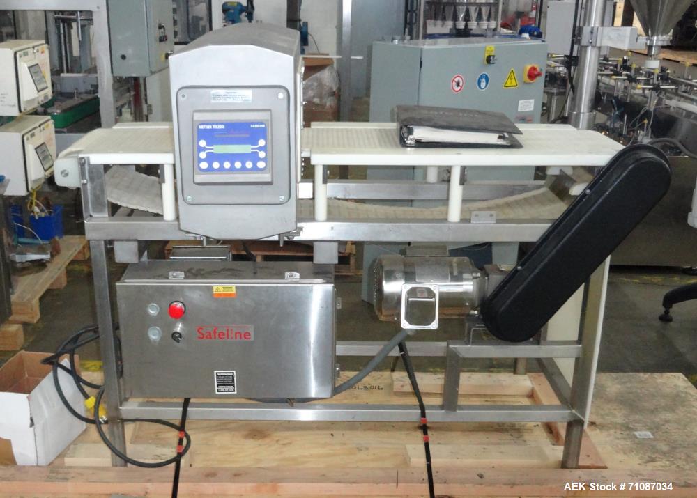 Used Mettler-Toledo Model SL 1200 Safeline Metal Detector.  Has a 13 1/2" x 7" high aperature.  Mounted over a 60" long x 12" wide conveyor.  Drive by a 1/2 HP, 1/60/115/208-230 Volt washdown motor. ...