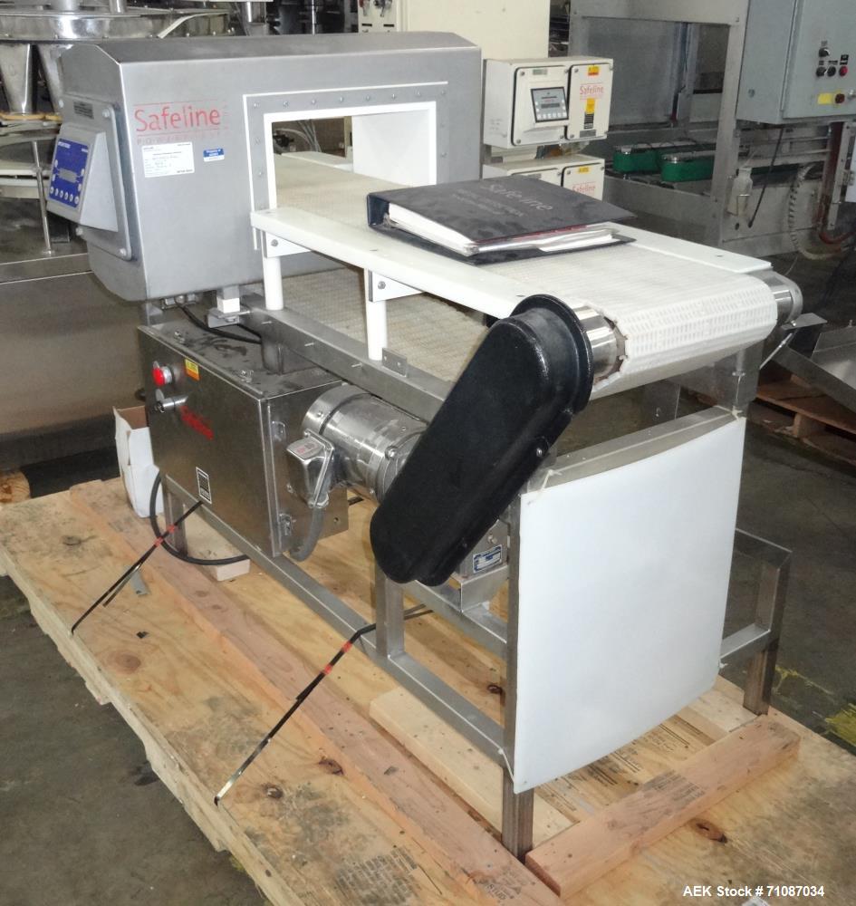 Used Mettler-Toledo Model SL 1200 Safeline Metal Detector.  Has a 13 1/2" x 7" high aperature.  Mounted over a 60" long x 12" wide conveyor.  Drive by a 1/2 HP, 1/60/115/208-230 Volt washdown motor. ...