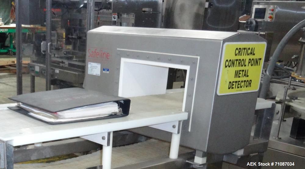 Used Mettler-Toledo Model SL 1200 Safeline Metal Detector.  Has a 13 1/2" x 7" high aperature.  Mounted over a 60" long x 12" wide conveyor.  Drive by a 1/2 HP, 1/60/115/208-230 Volt washdown motor. ...