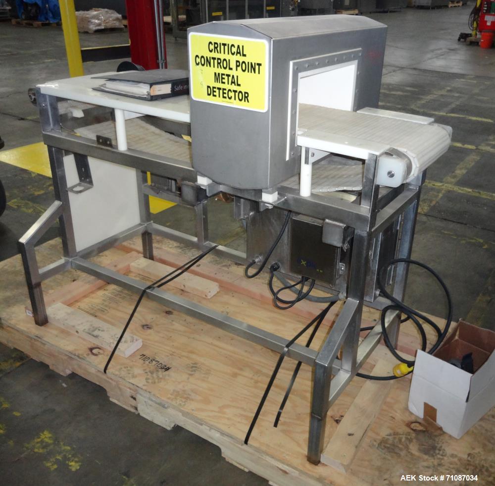 Used Mettler-Toledo Model SL 1200 Safeline Metal Detector.  Has a 13 1/2" x 7" high aperature.  Mounted over a 60" long x 12" wide conveyor.  Drive by a 1/2 HP, 1/60/115/208-230 Volt washdown motor. ...