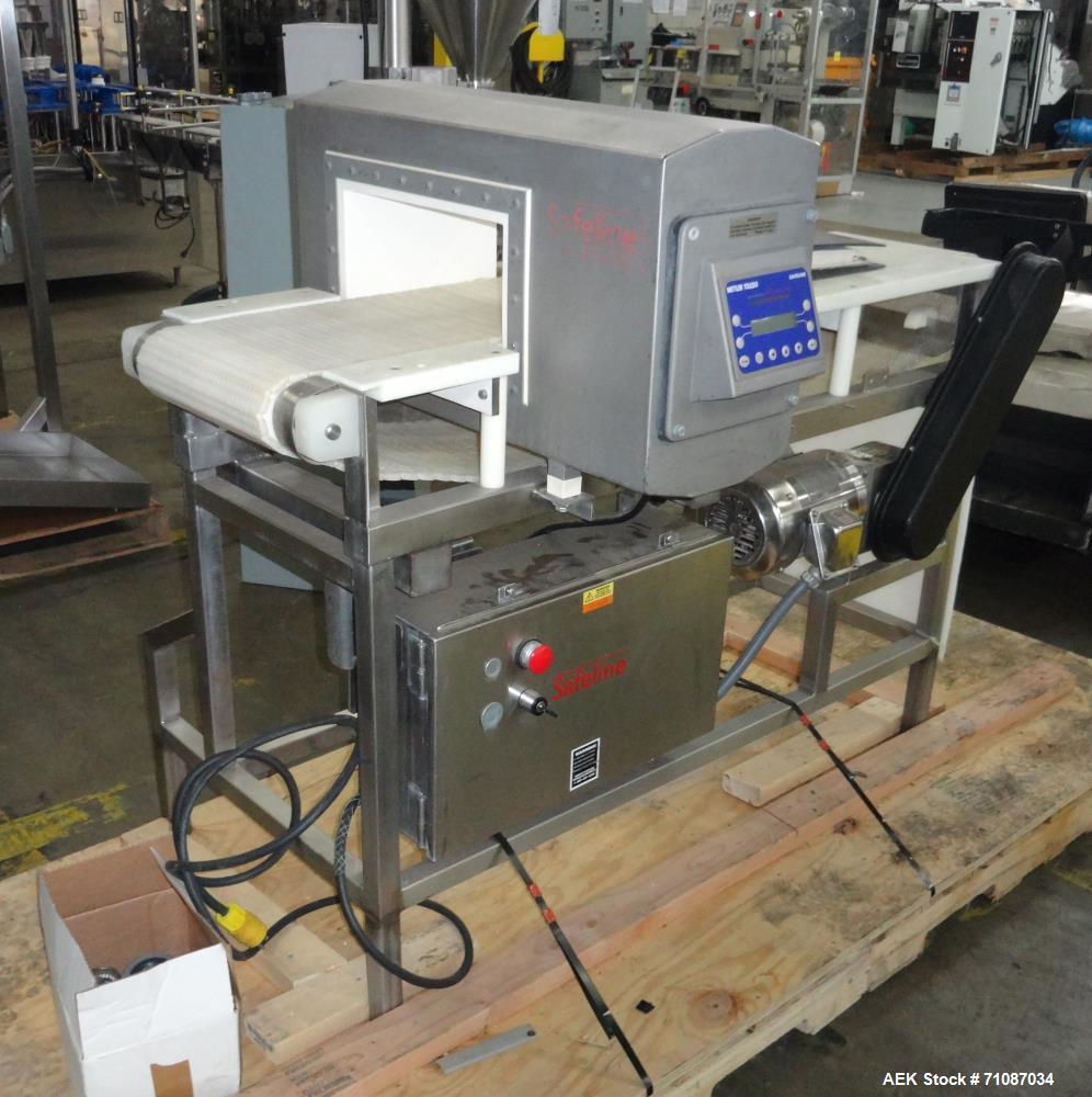 Used Mettler-Toledo Model SL 1200 Safeline Metal Detector.  Has a 13 1/2" x 7" high aperature.  Mounted over a 60" long x 12" wide conveyor.  Drive by a 1/2 HP, 1/60/115/208-230 Volt washdown motor. ...
