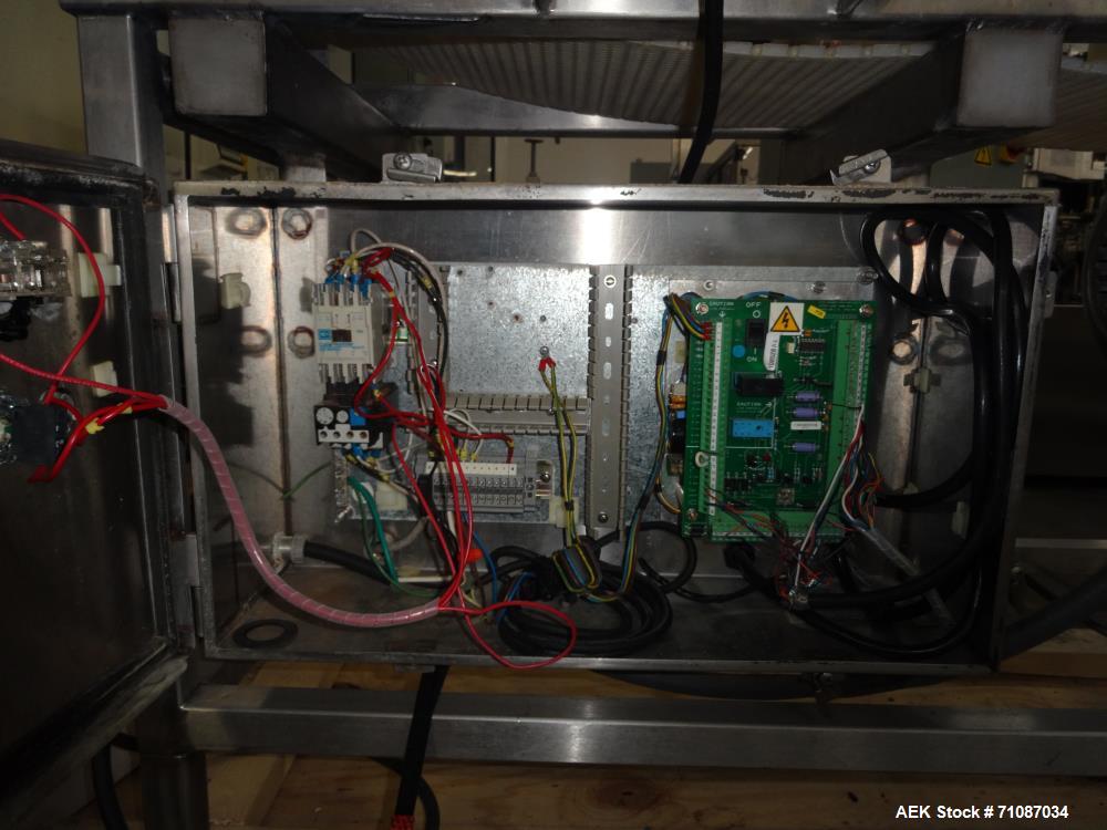 Used Mettler-Toledo Model SL 1200 Safeline Metal Detector.  Has a 13 1/2" x 7" high aperature.  Mounted over a 60" long x 12" wide conveyor.  Drive by a 1/2 HP, 1/60/115/208-230 Volt washdown motor. ...