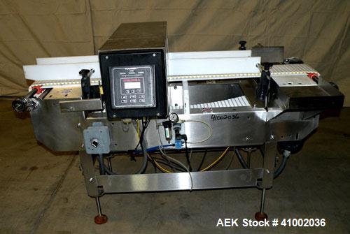 Used Ramsey Icore Metal Detector, Model Metal Scout IIE 808. Usable aperture size 7 3/4" wide x 6 1/2" high x 9 3/4" deep. Includes a Ramsey model 506 conveyor. 6" wide x 59" long plastic belt, drive...