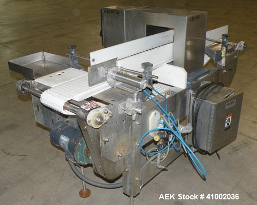 Used Ramsey Icore Metal Detector, Model Metal Scout IIE 808. Usable aperture size 7 3/4" wide x 6 1/2" high x 9 3/4" deep. Includes a Ramsey model 506 conveyor. 6" wide x 59" long plastic belt, drive...