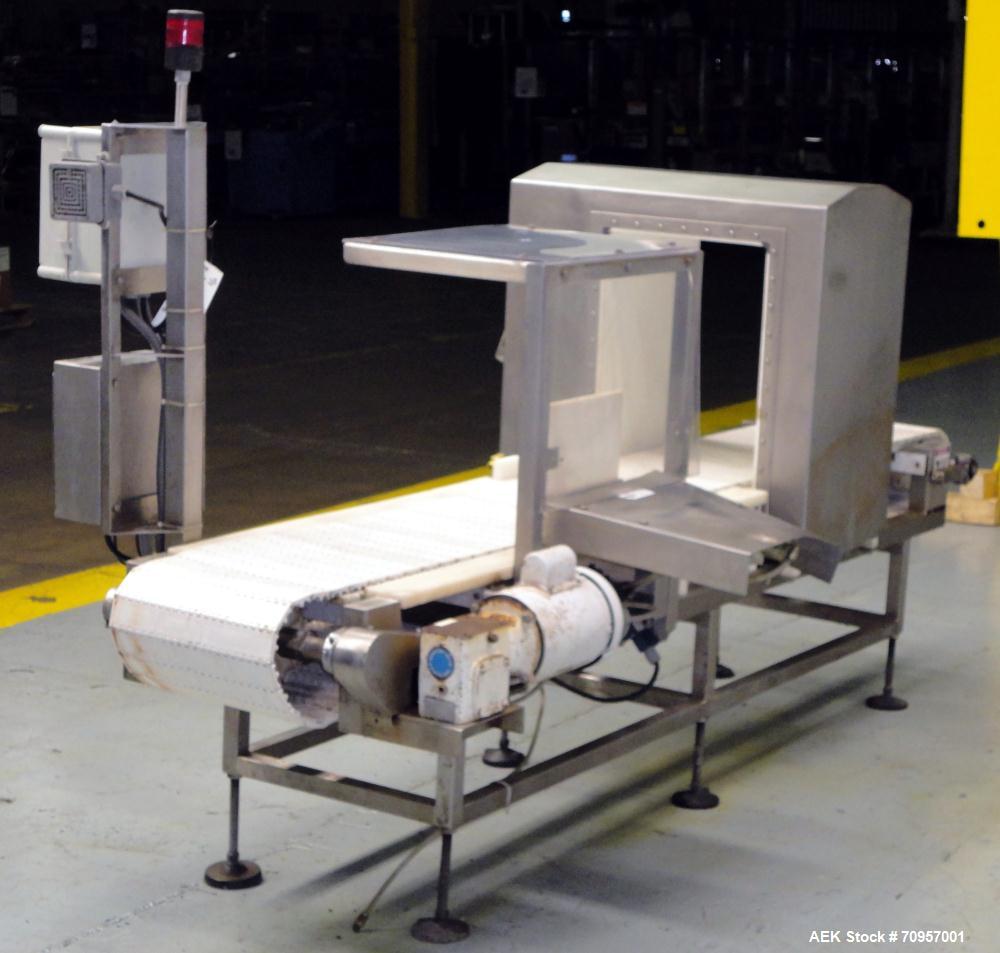 Used Safeline Model 16X22 Metal Detector. Has 16" wide(400mm) x 22" tall (550mm) product aperature, and 20-1/2" tall with current belt, 300 KHz Frequency. Mounted on 108" long x 14" wide conveyor wit...