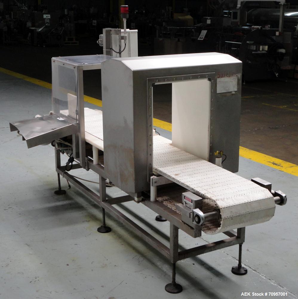 Used Safeline Model 16X22 Metal Detector. Has 16" wide(400mm) x 22" tall (550mm) product aperature, and 20-1/2" tall with current belt, 300 KHz Frequency. Mounted on 108" long x 14" wide conveyor wit...