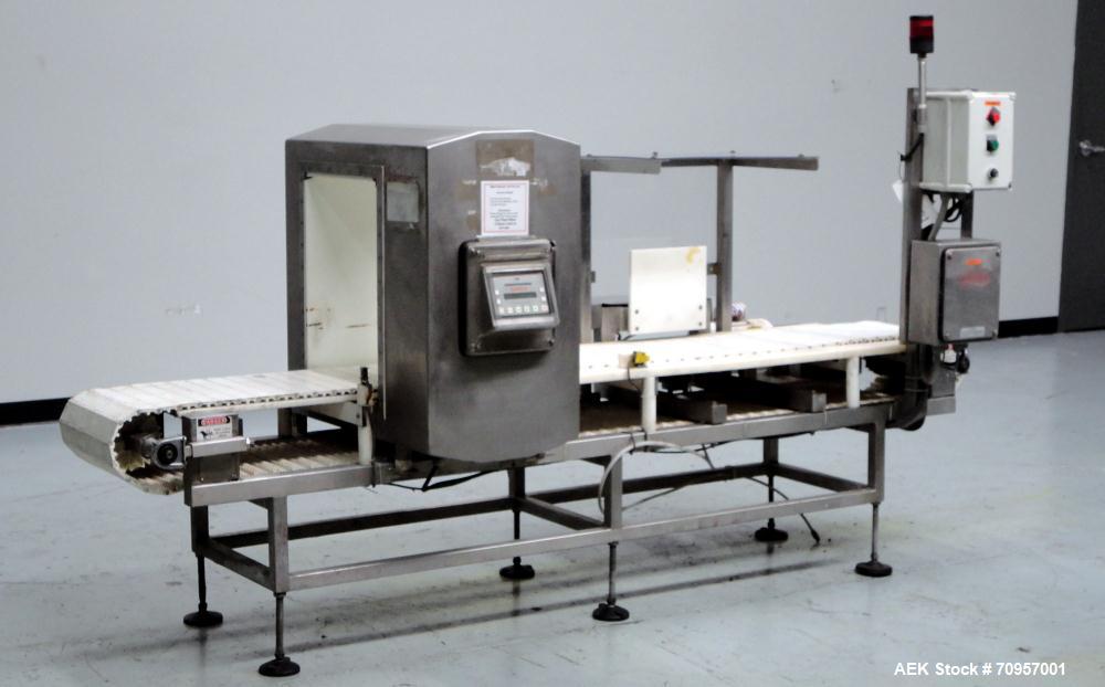 Used Safeline Model 16X22 Metal Detector. Has 16" wide(400mm) x 22" tall (550mm) product aperature, and 20-1/2" tall with current belt, 300 KHz Frequency. Mounted on 108" long x 14" wide conveyor wit...