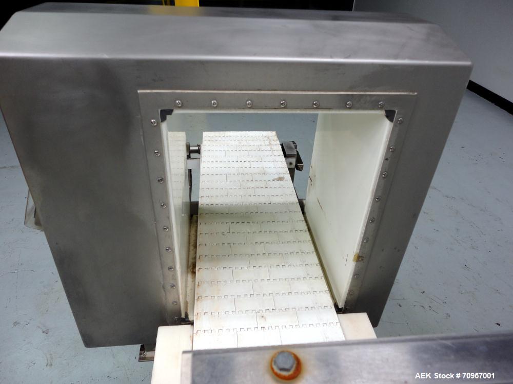 Used Safeline Model 16X22 Metal Detector. Has 16" wide(400mm) x 22" tall (550mm) product aperature, and 20-1/2" tall with current belt, 300 KHz Frequency. Mounted on 108" long x 14" wide conveyor wit...