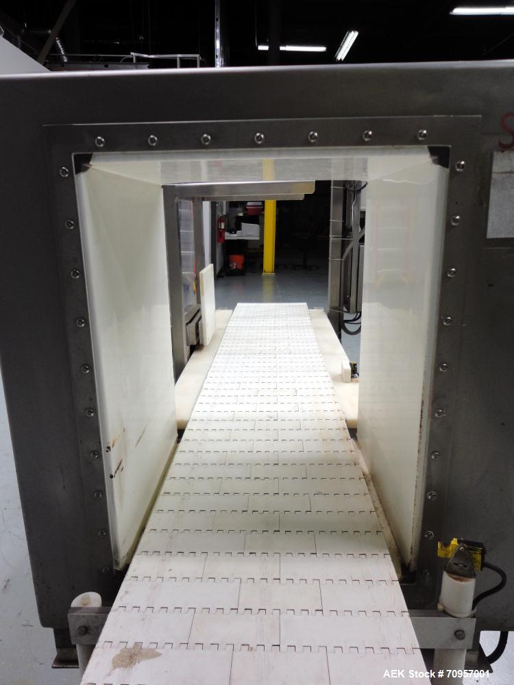 Used Safeline Model 16X22 Metal Detector. Has 16" wide(400mm) x 22" tall (550mm) product aperature, and 20-1/2" tall with current belt, 300 KHz Frequency. Mounted on 108" long x 14" wide conveyor wit...