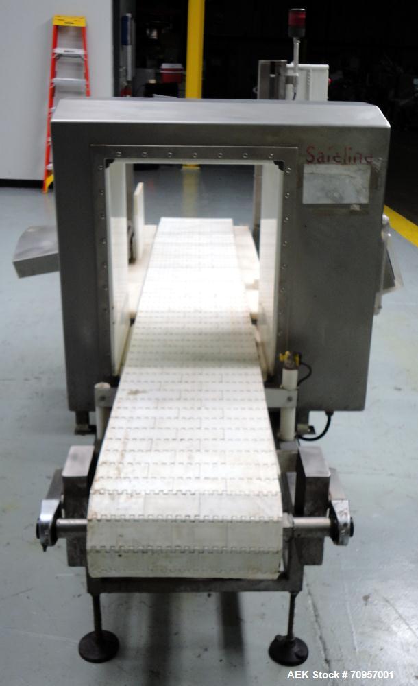 Used Safeline Model 16X22 Metal Detector. Has 16" wide(400mm) x 22" tall (550mm) product aperature, and 20-1/2" tall with current belt, 300 KHz Frequency. Mounted on 108" long x 14" wide conveyor wit...