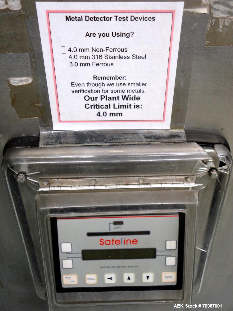 Used Safeline Model 16X22 Metal Detector. Has 16" wide(400mm) x 22" tall (550mm) product aperature, and 20-1/2" tall with current belt, 300 KHz Frequency. Mounted on 108" long x 14" wide conveyor wit...