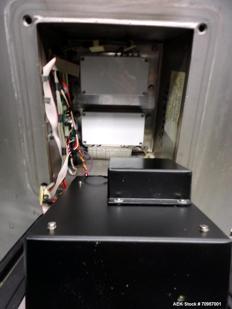 Used Safeline Model 16X22 Metal Detector. Has 16" wide(400mm) x 22" tall (550mm) product aperature, and 20-1/2" tall with current belt, 300 KHz Frequency. Mounted on 108" long x 14" wide conveyor wit...