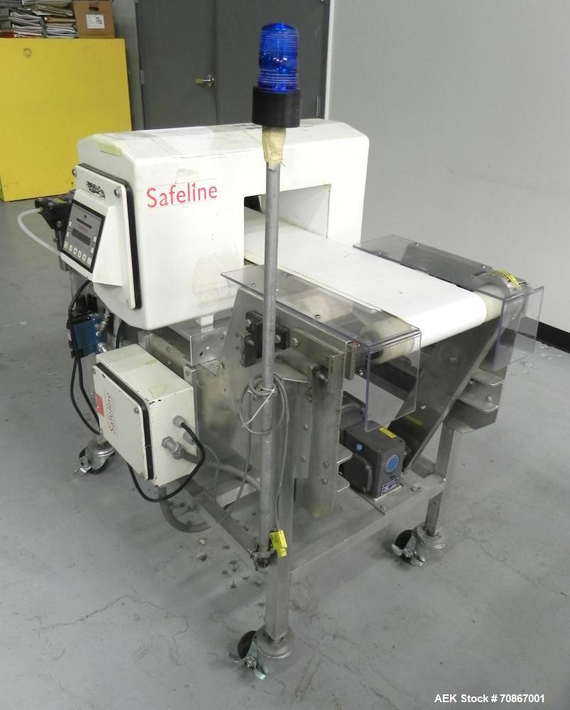 Used Safeline Model 250X150 Metal Detector. Has a 10" (wide) by 5.25" product aperature. Mounted on a Goring Kerr 48" (long) by 12" (wide) aluminum conveyor with Air Knife reject station. Has a 1.07 ...