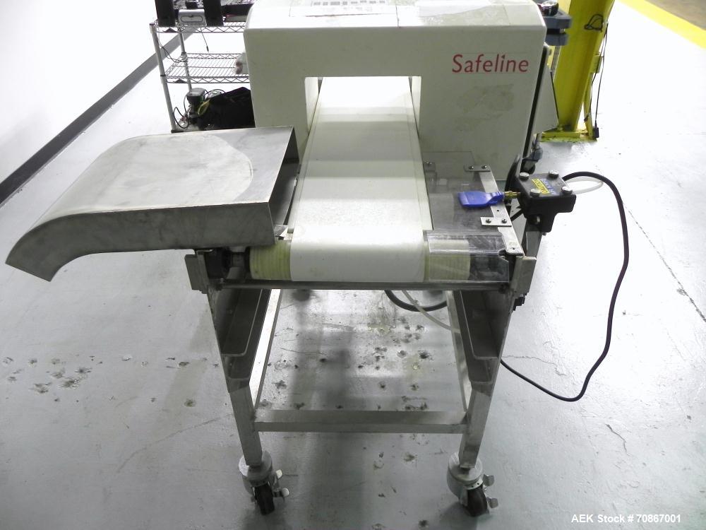 Used Safeline Model 250X150 Metal Detector. Has a 10" (wide) by 5.25" product aperature. Mounted on a Goring Kerr 48" (long) by 12" (wide) aluminum conveyor with Air Knife reject station. Has a 1.07 ...