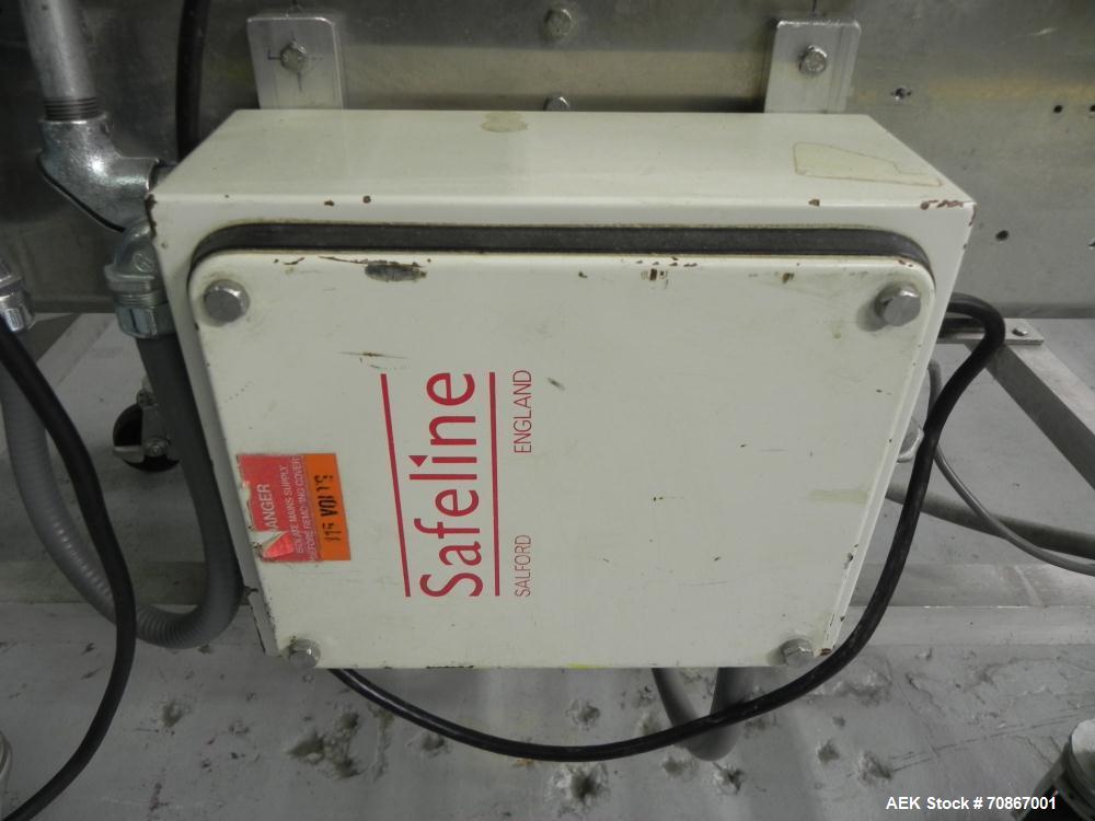 Used Safeline Model 250X150 Metal Detector. Has a 10" (wide) by 5.25" product aperature. Mounted on a Goring Kerr 48" (long) by 12" (wide) aluminum conveyor with Air Knife reject station. Has a 1.07 ...