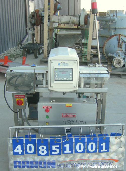 Used Safeline Metal Detector, Model PPH+/08x4/P/300-800/ABS/V3/RC/RS232.Aperture size approximately 8" wide x 3 1/4" high x 11 1/4" long.Includes a control panel and a belt conveyor, 4 3/4" wide x 42...
