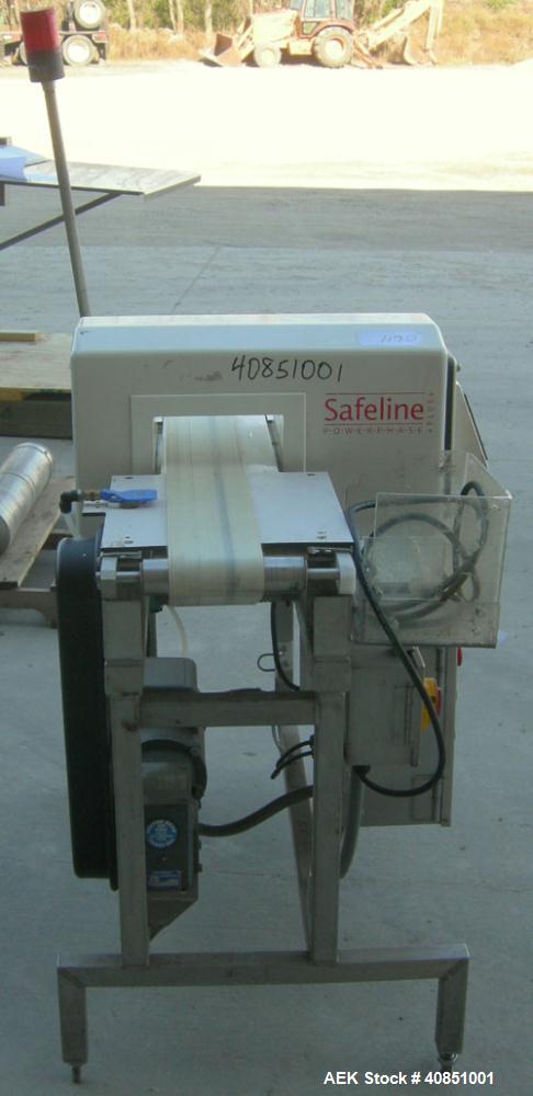 Used Safeline Metal Detector, Model PPH+/08x4/P/300-800/ABS/V3/RC/RS232.Aperture size approximately 8" wide x 3 1/4" high x 11 1/4" long.Includes a control panel and a belt conveyor, 4 3/4" wide x 42...