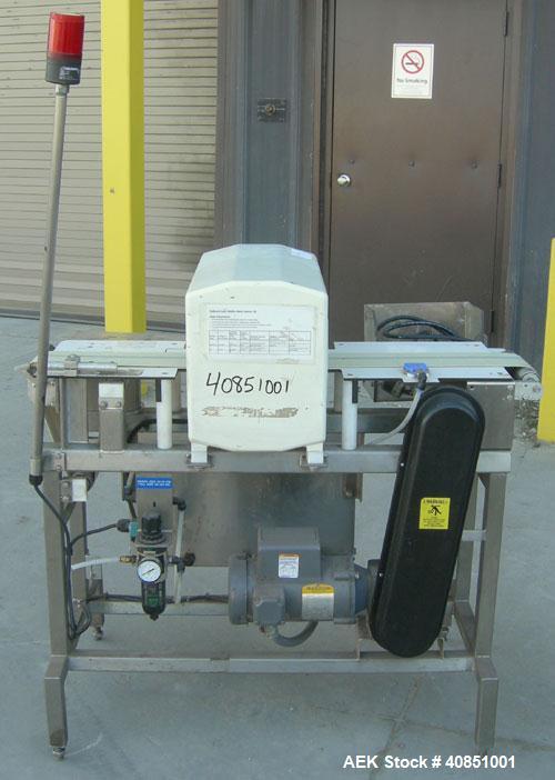 Used Safeline Metal Detector, Model PPH+/08x4/P/300-800/ABS/V3/RC/RS232.Aperture size approximately 8" wide x 3 1/4" high x 11 1/4" long.Includes a control panel and a belt conveyor, 4 3/4" wide x 42...