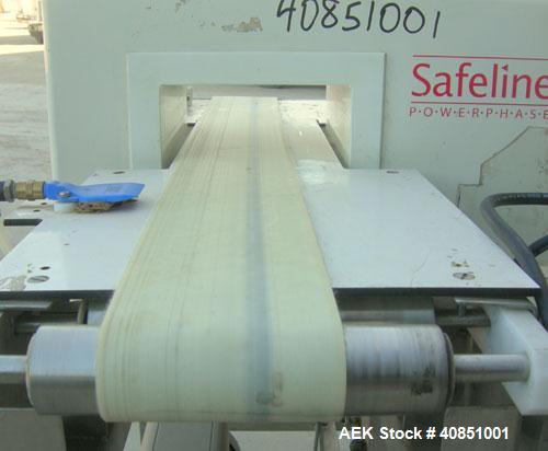 Used Safeline Metal Detector, Model PPH+/08x4/P/300-800/ABS/V3/RC/RS232.Aperture size approximately 8" wide x 3 1/4" high x 11 1/4" long.Includes a control panel and a belt conveyor, 4 3/4" wide x 42...